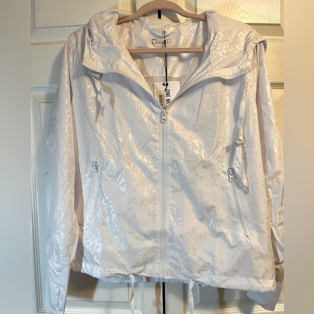 Zyia NWT white jacket with leopard print. Size Medium.